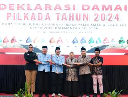 Muhidin-Hasnur dan Raudatul Jannah-Rozanie Bergandengan Tangan Jelang Pencoblosan