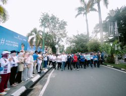 Bank Kalsel Gelar Jalan Sehat #ASNbanggapakaiQRIS