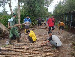 Warga Puntik Luar Perbaiki Jalan Rusak Pasca Banjir Secara Mandiri dan Tunggu Perhatian Pemkab
